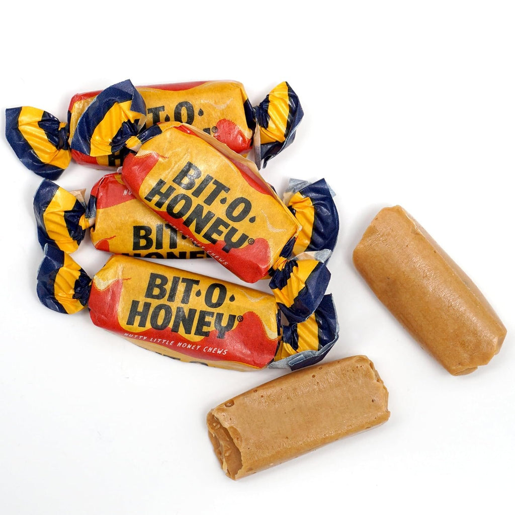 Bit-O-Honey wrapped candies with unwrapped honey almond taffy